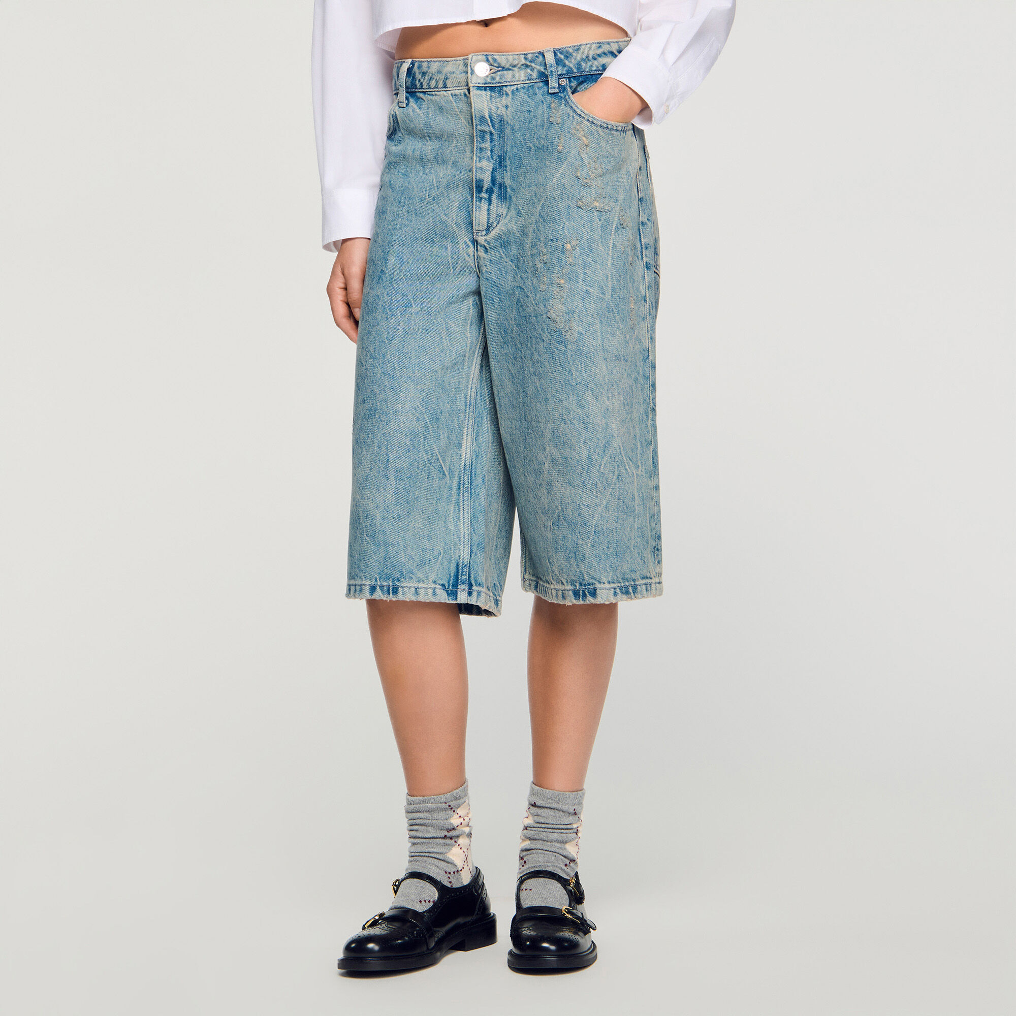 Distressed denim Bermuda shorts