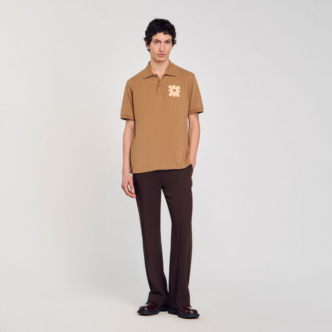 Polo shirt with flower patch