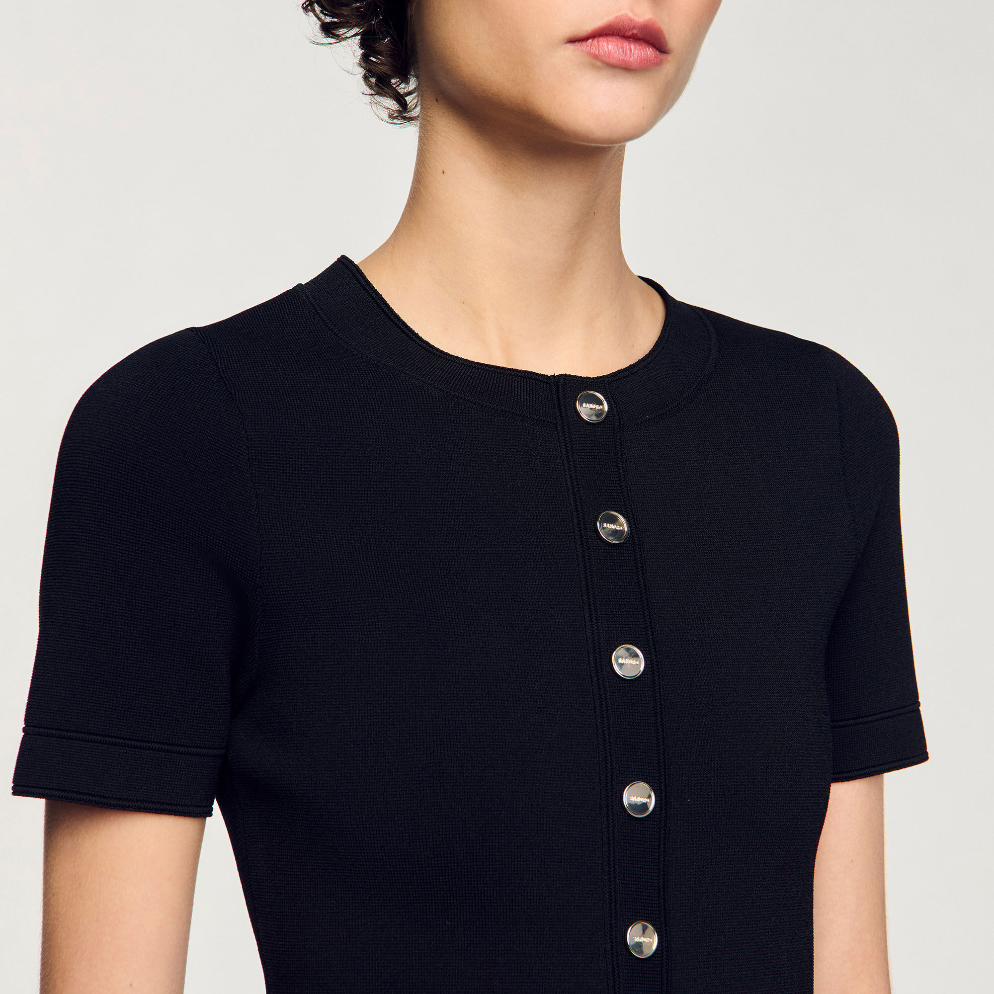 Short knit dress with ruffle