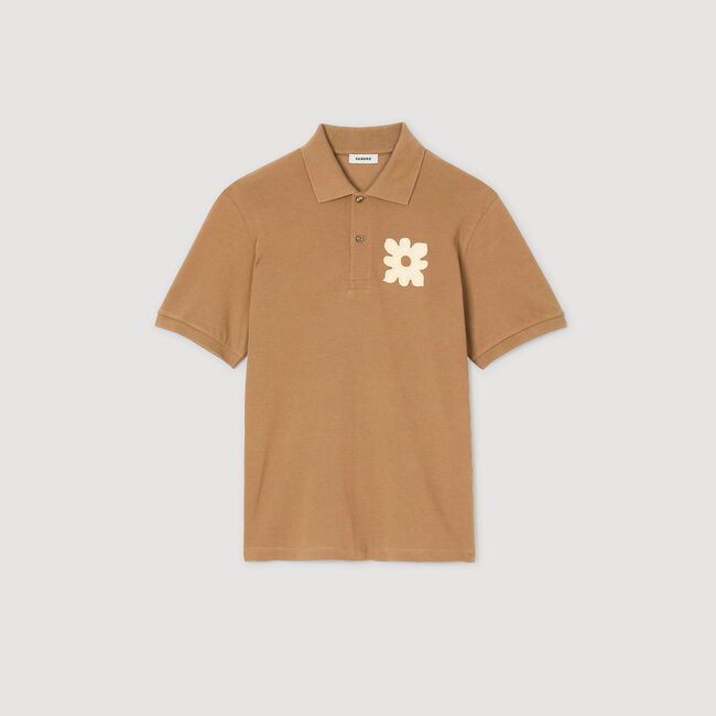 Polo shirt with flower patch