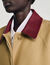 Trench coat with leather collar