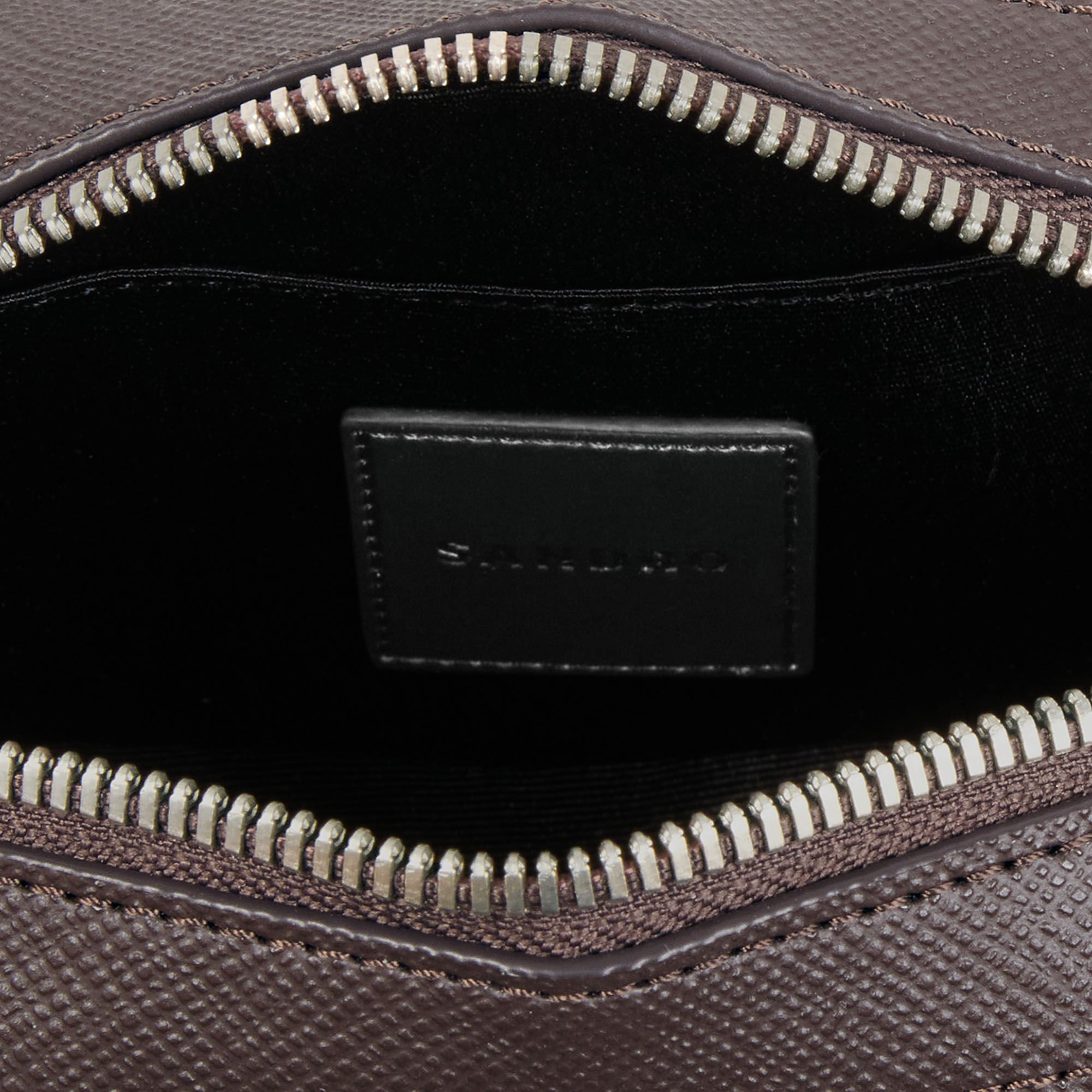 Small reconstituted leather bag