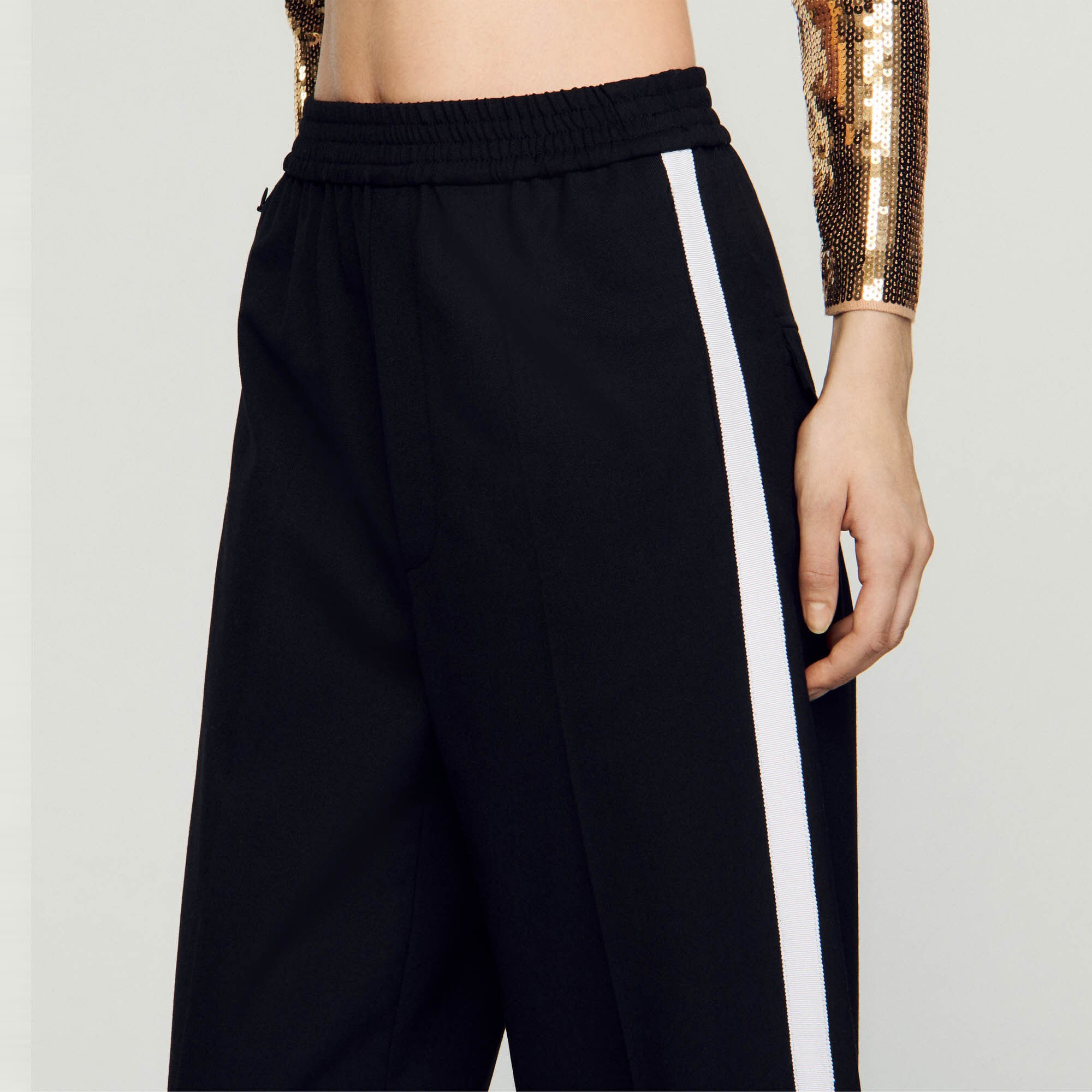 Trousers with side stripes