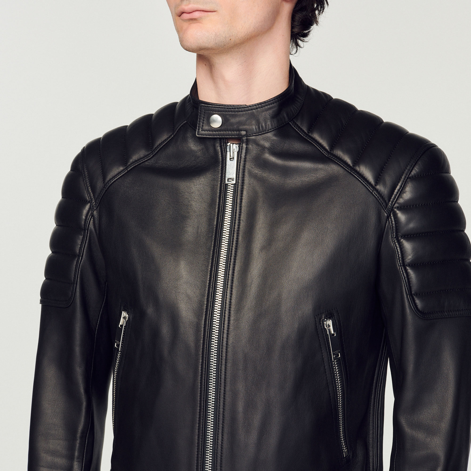 Leather jacket with quilted trims