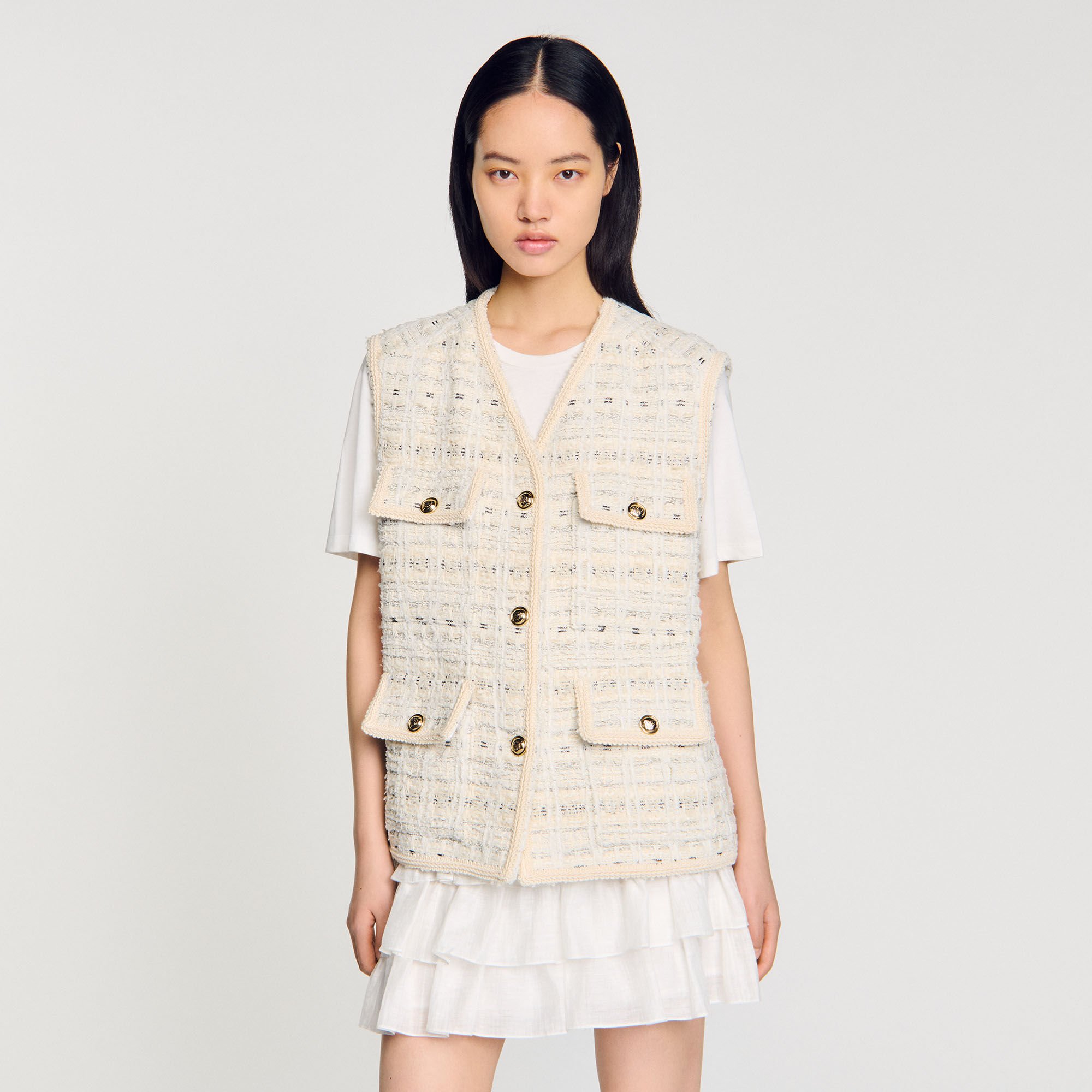 Sleeveless tweed jacket