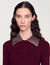 Jumper with metal stud collar