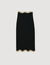 Long knitted skirt with chain detail