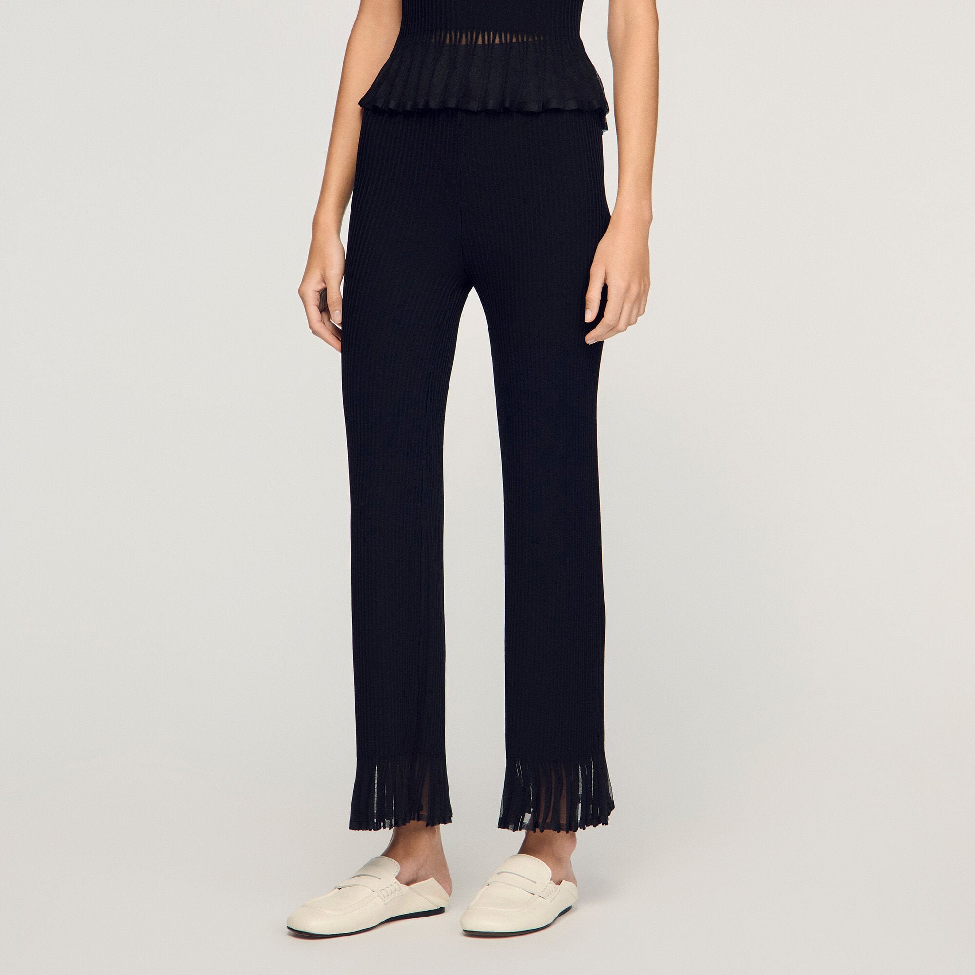 Ruffled knit trousers