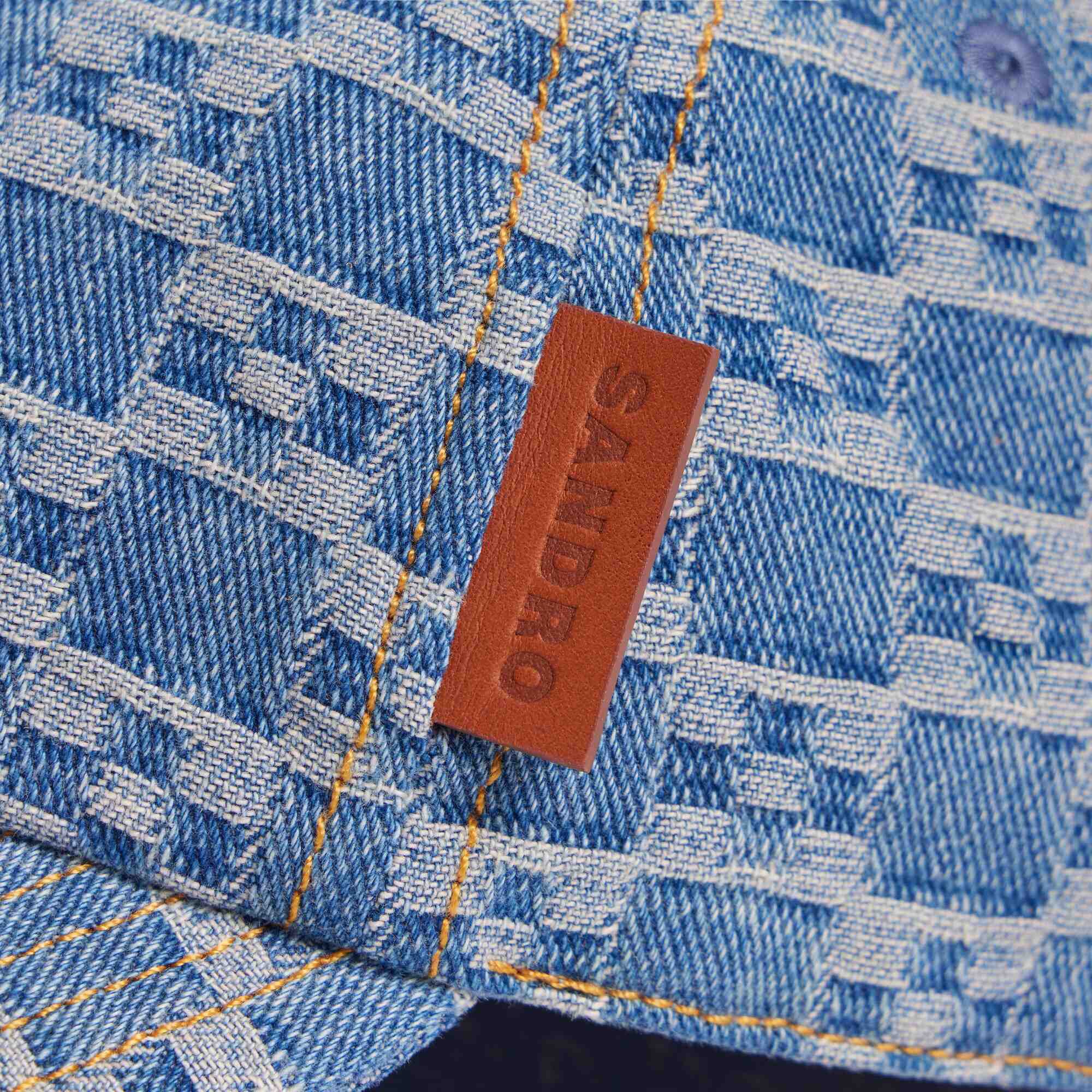 Denim cap with cross motif