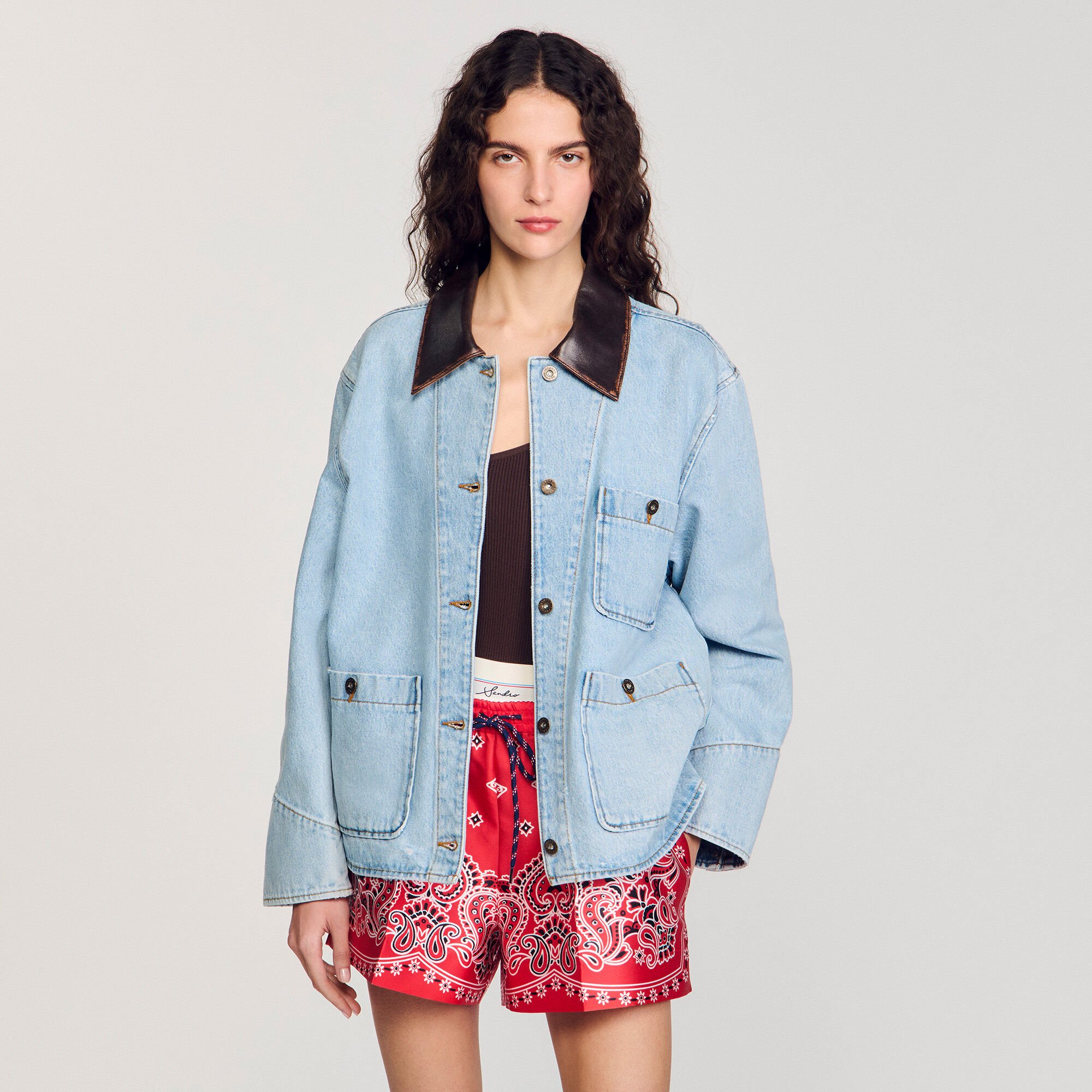 Denim jacket with leather collar