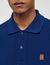 Polo shirt with leather logo