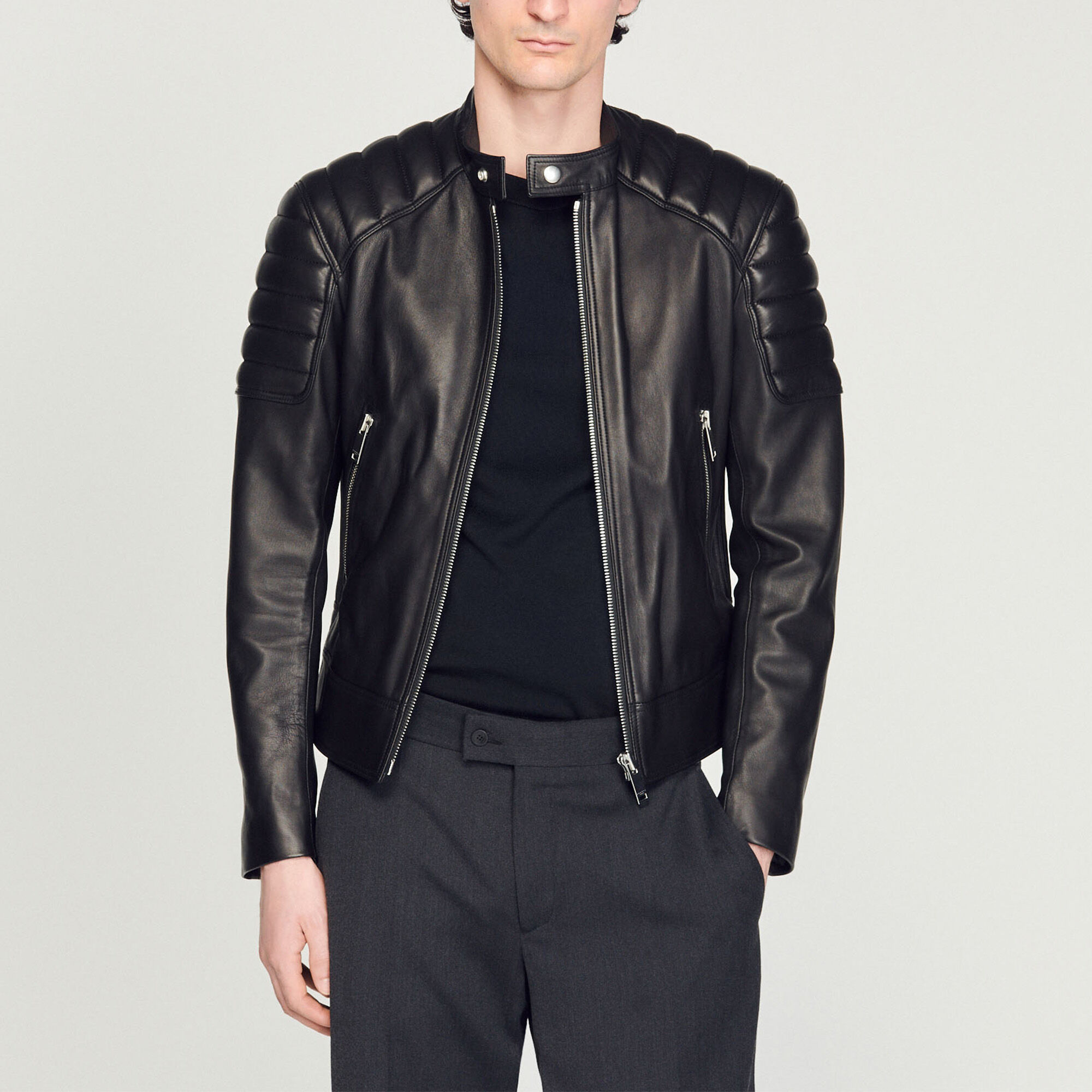 Leather jacket with quilted trims