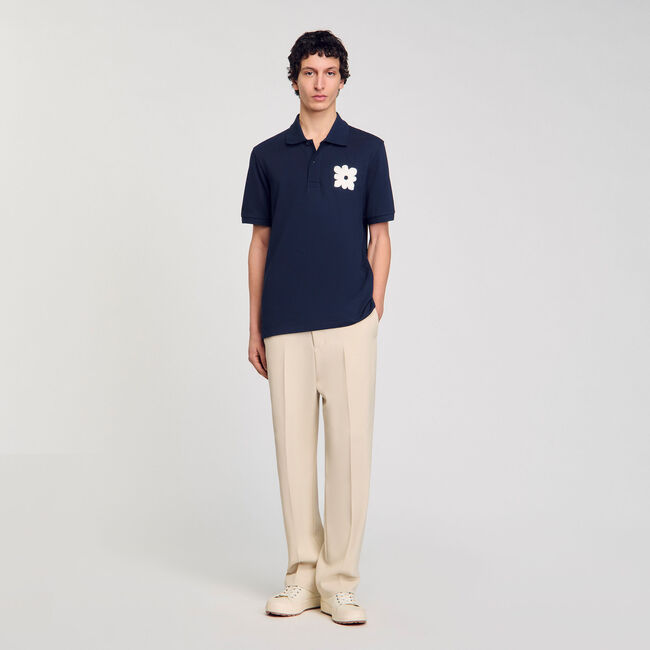 Polo shirt with flower patch
