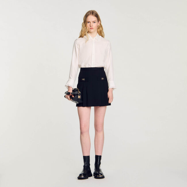 Short skirt with stitched pleats