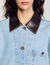 Denim jacket with leather collar