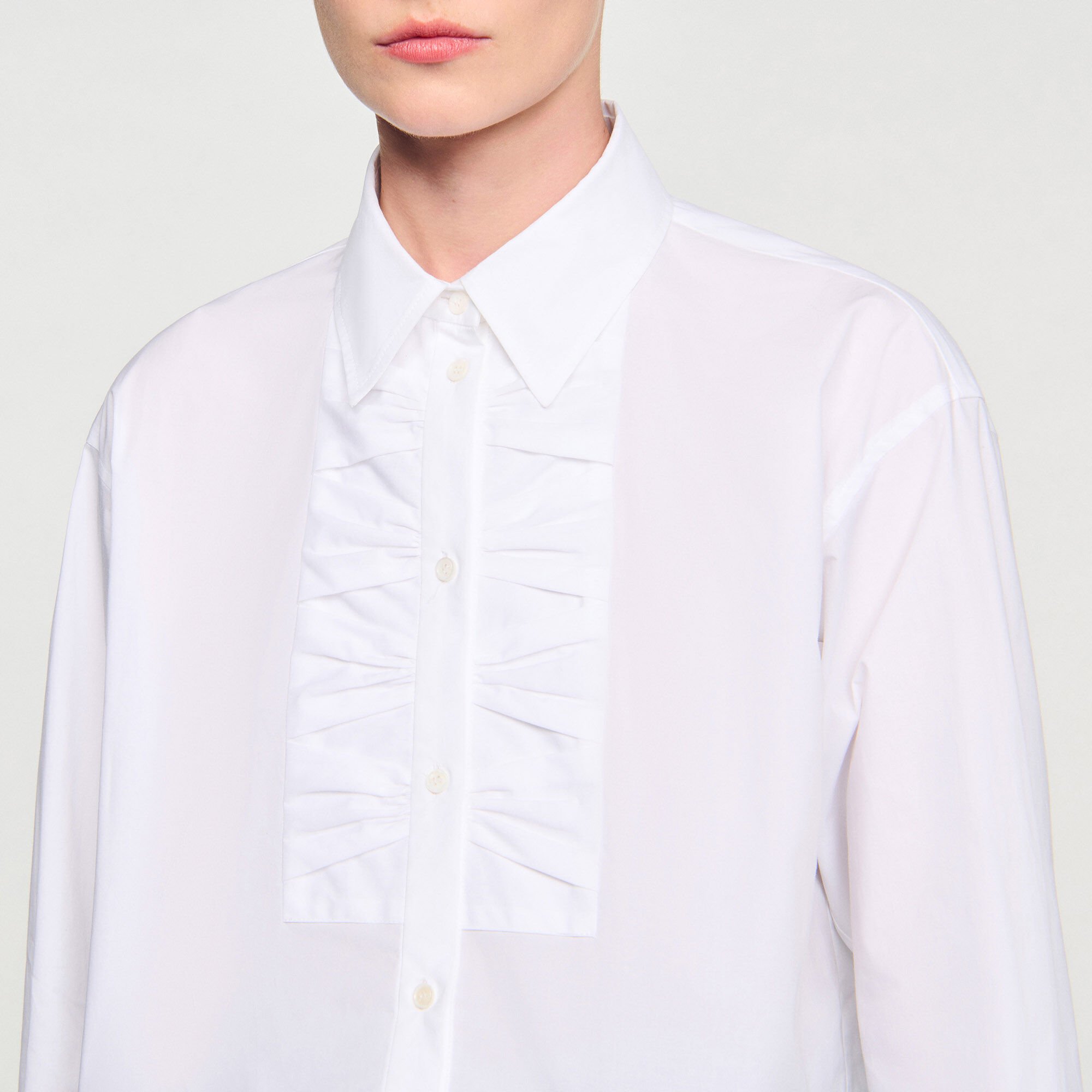 Cropped shirt with bow details