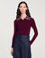 Jumper with metal stud collar