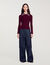 Jumper with metal stud collar
