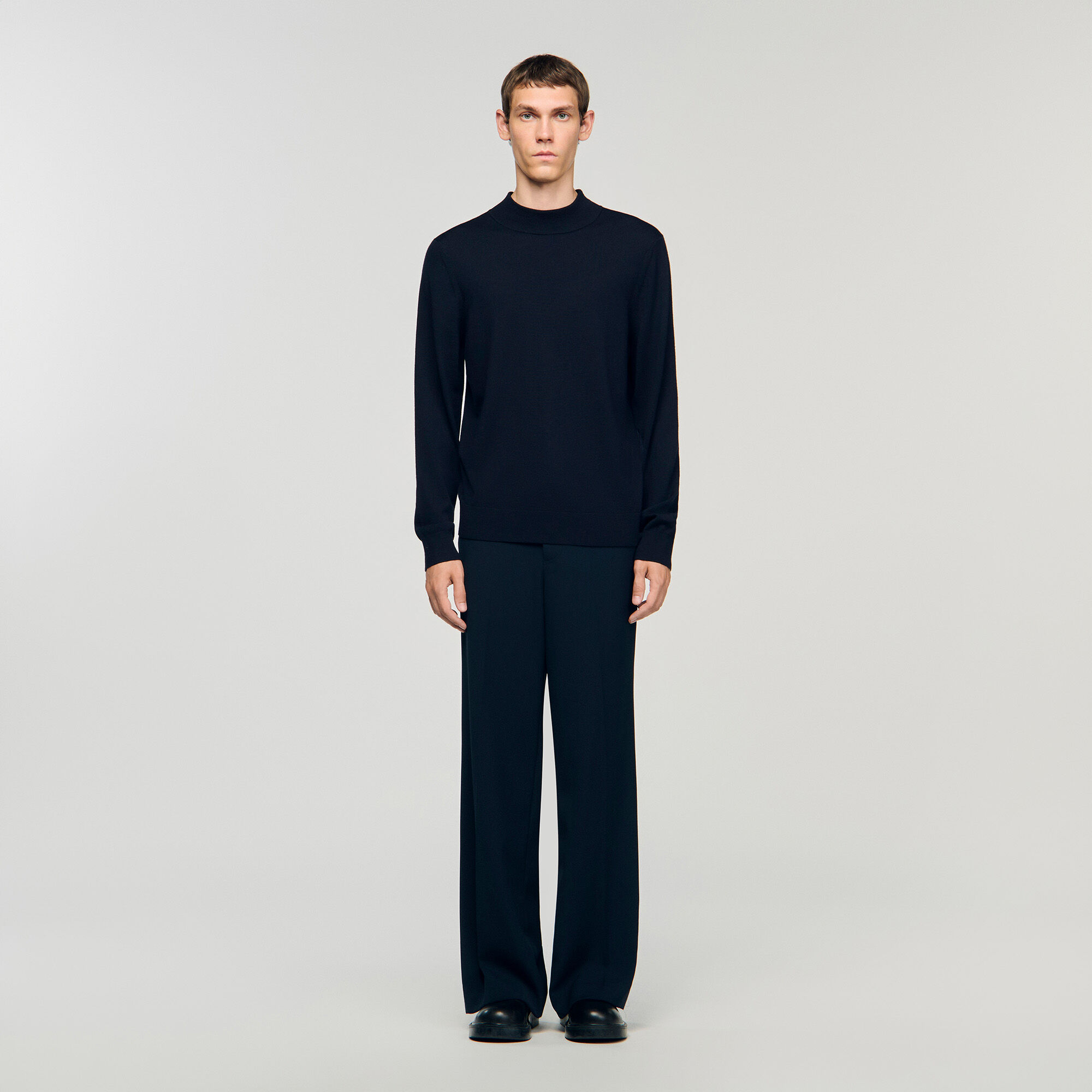 Wool jumper with a high collar