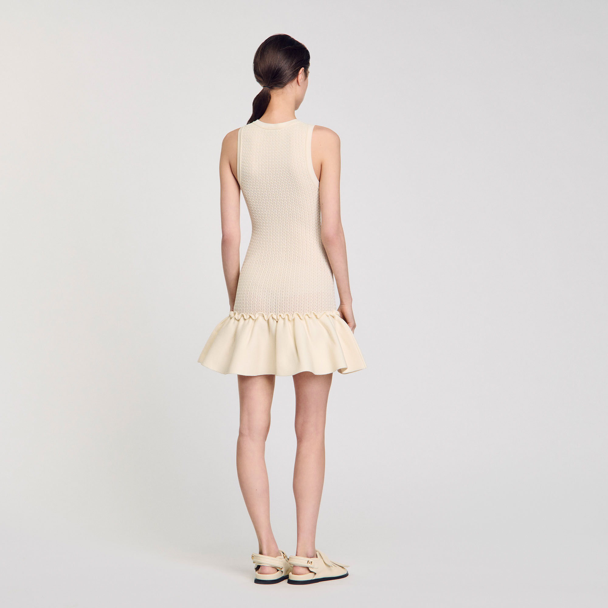 Short knit dress with ruffle
