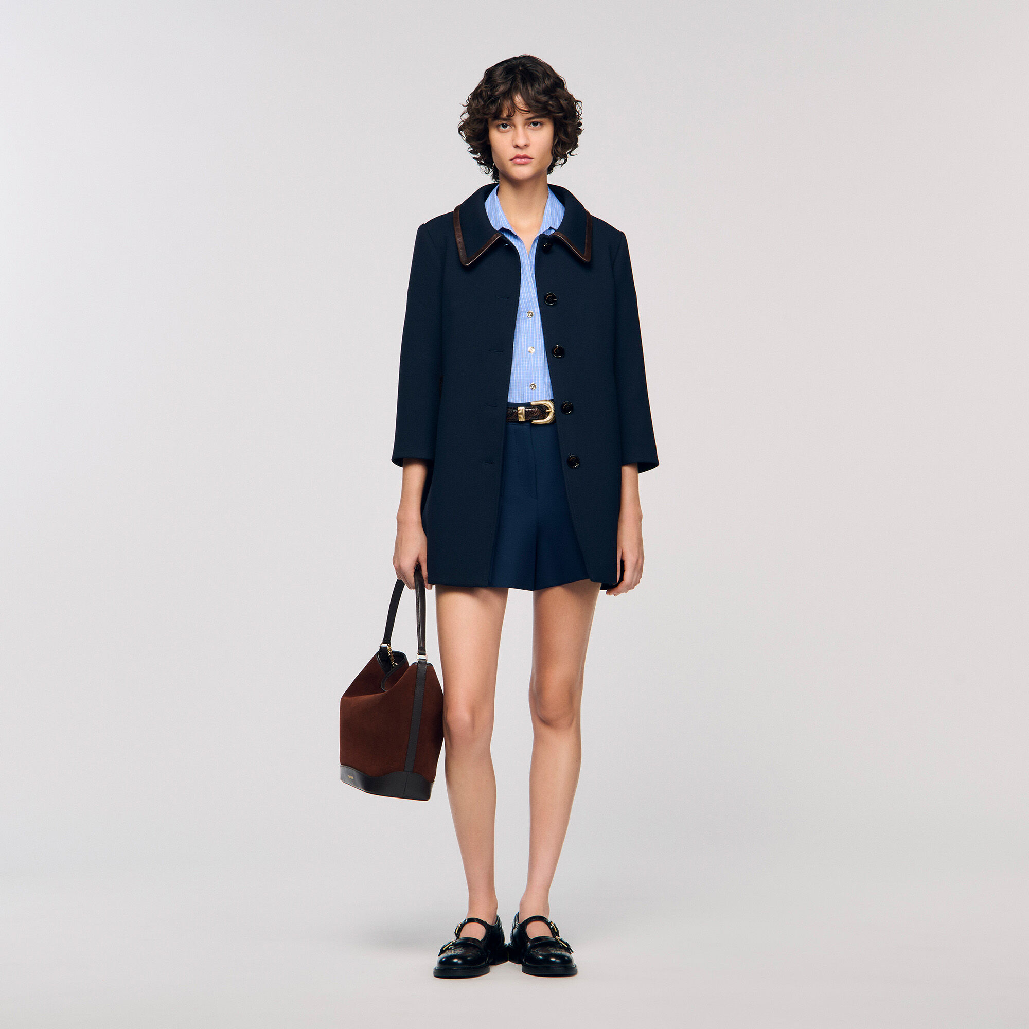 Coat with leather stripes