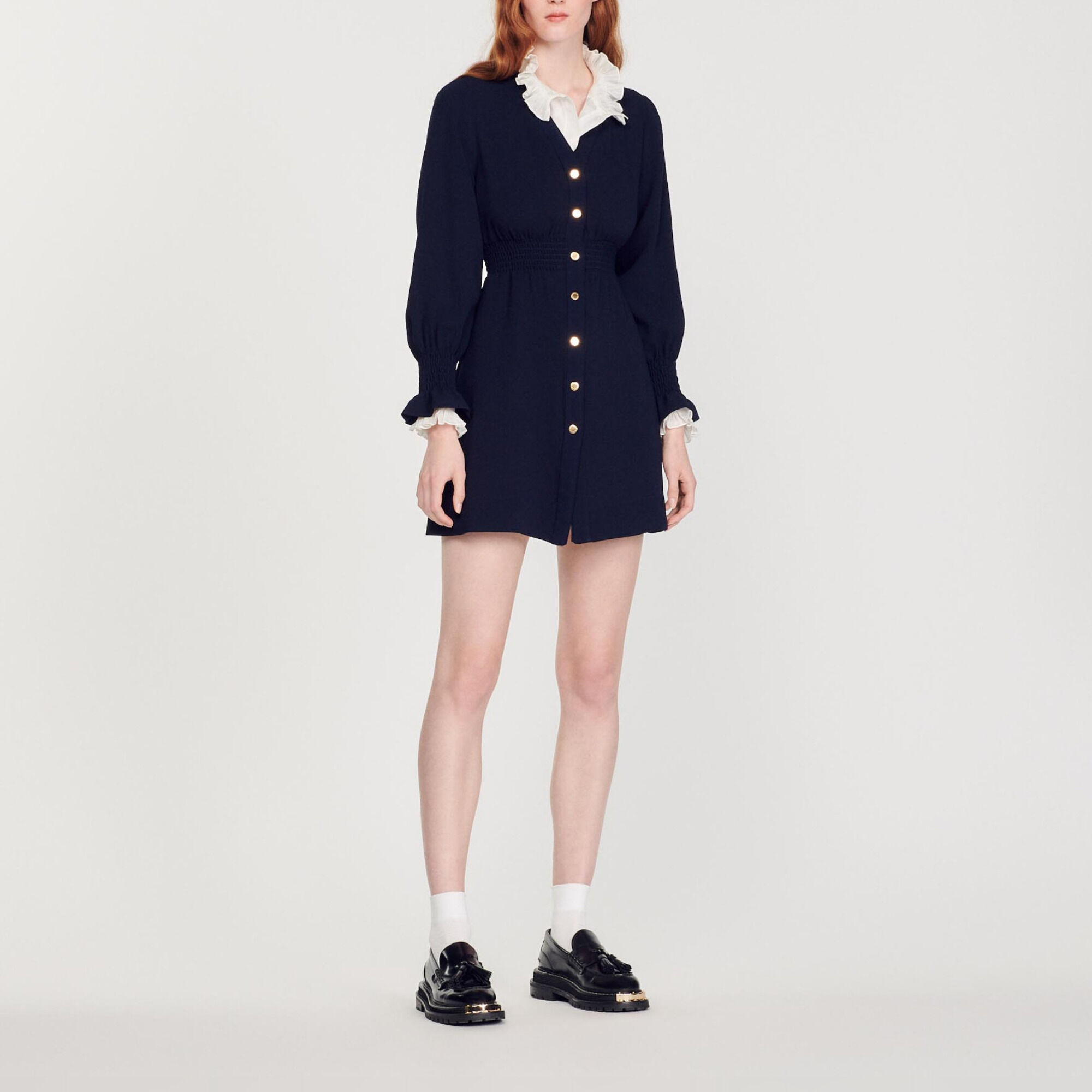 Dress with press studs and smocked belt