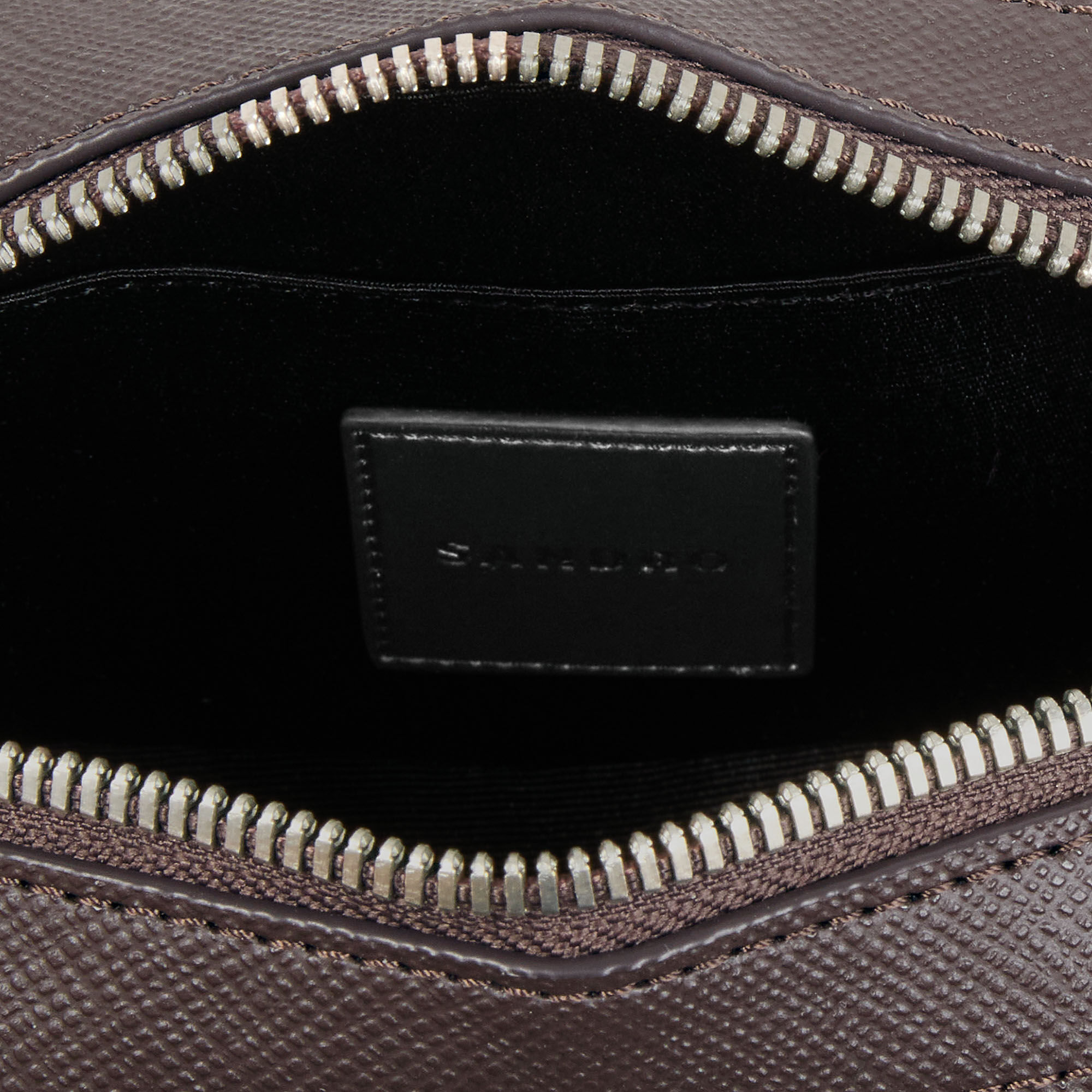 Small reconstituted leather bag