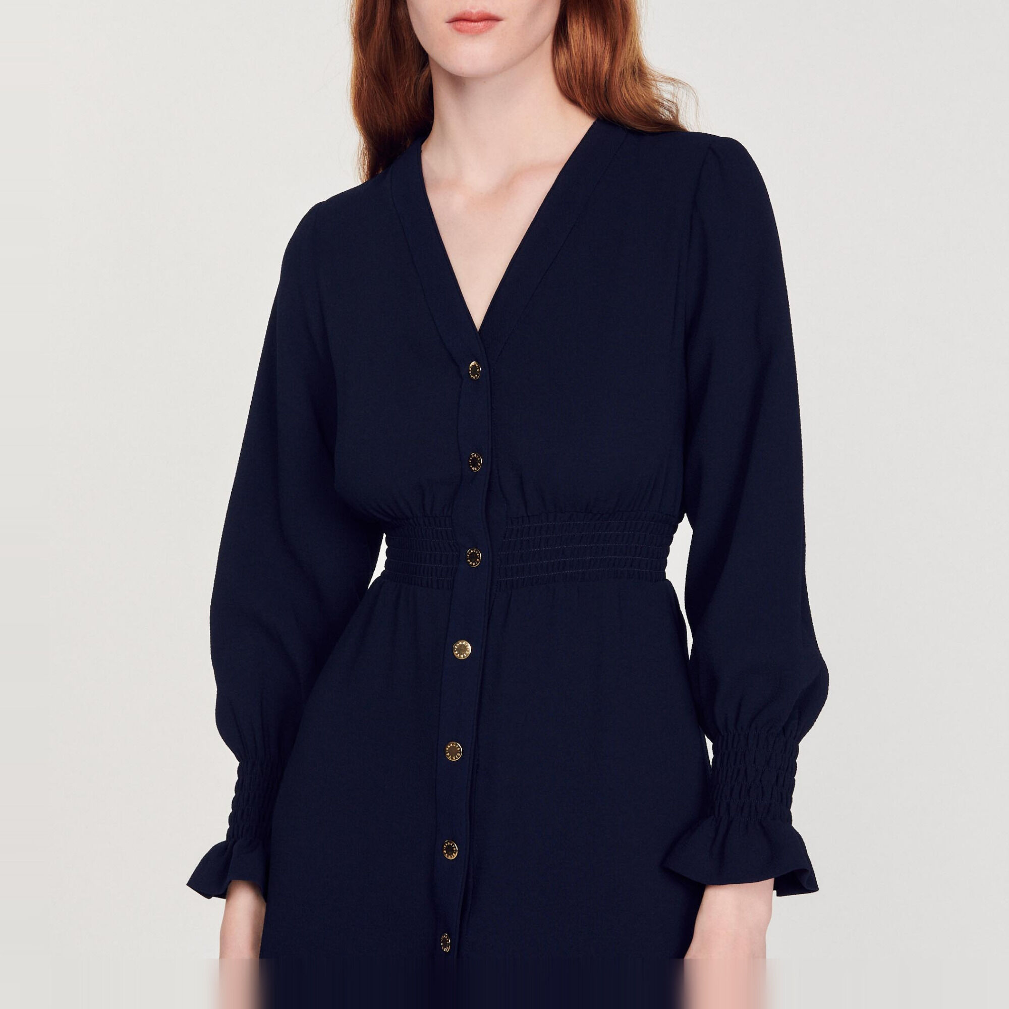 Dress with press studs and smocked belt