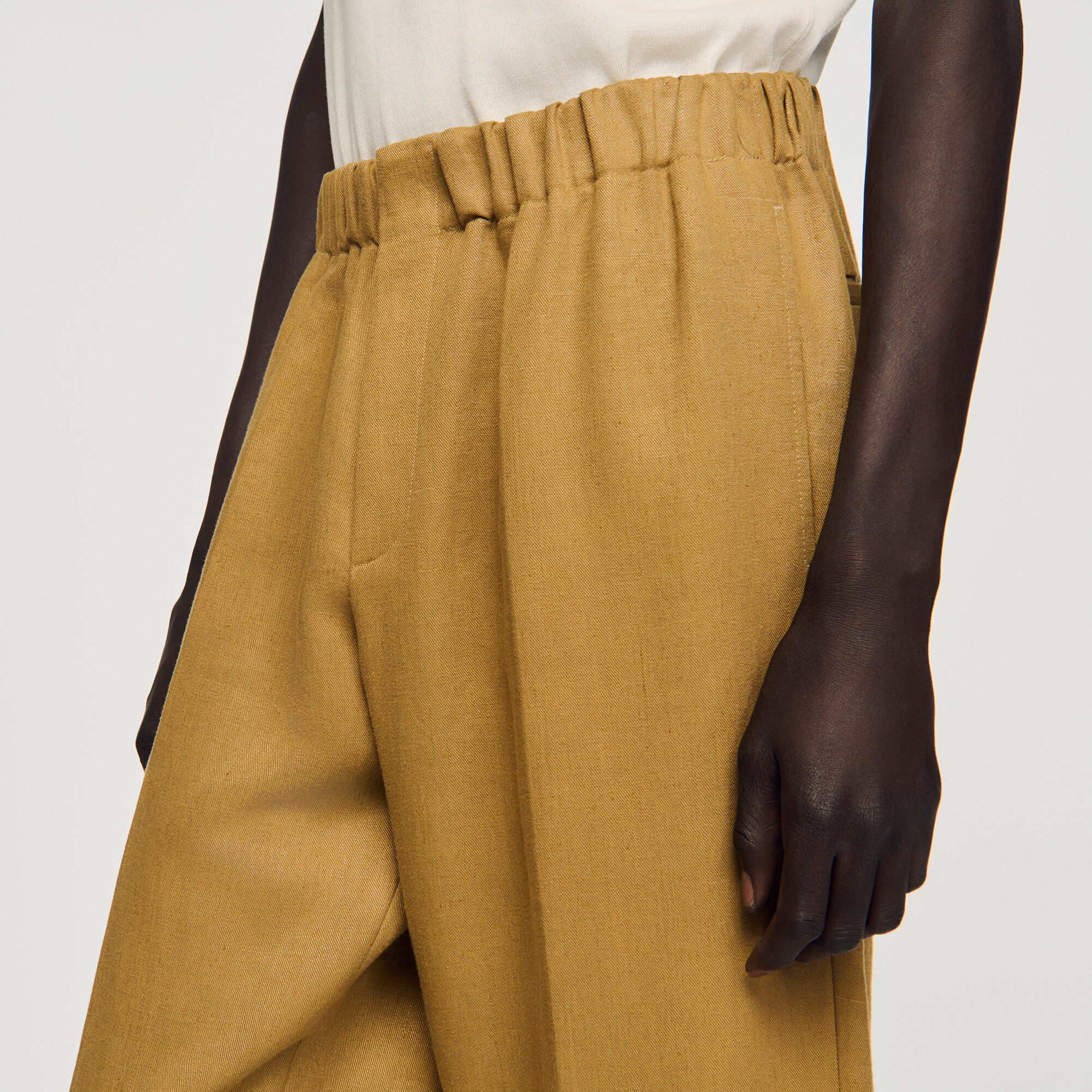 Wide-leg elasticated linen trousers