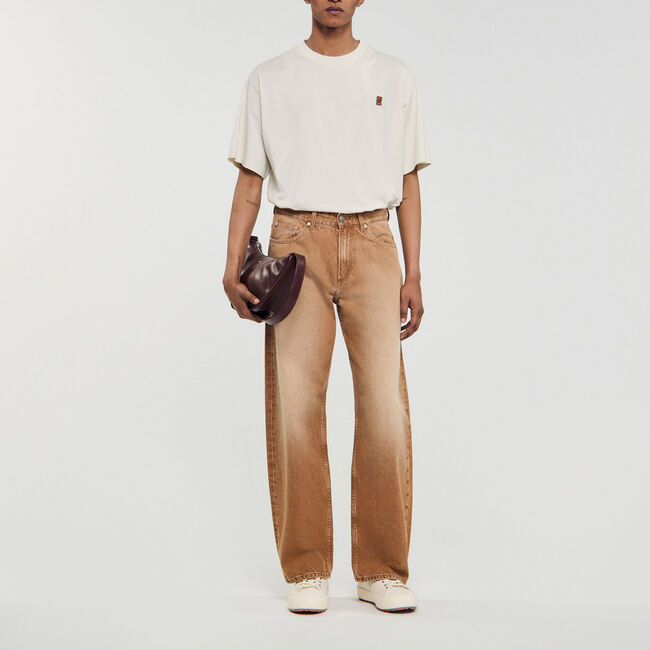 Faded cotton baggy jeans - Men | Sandro