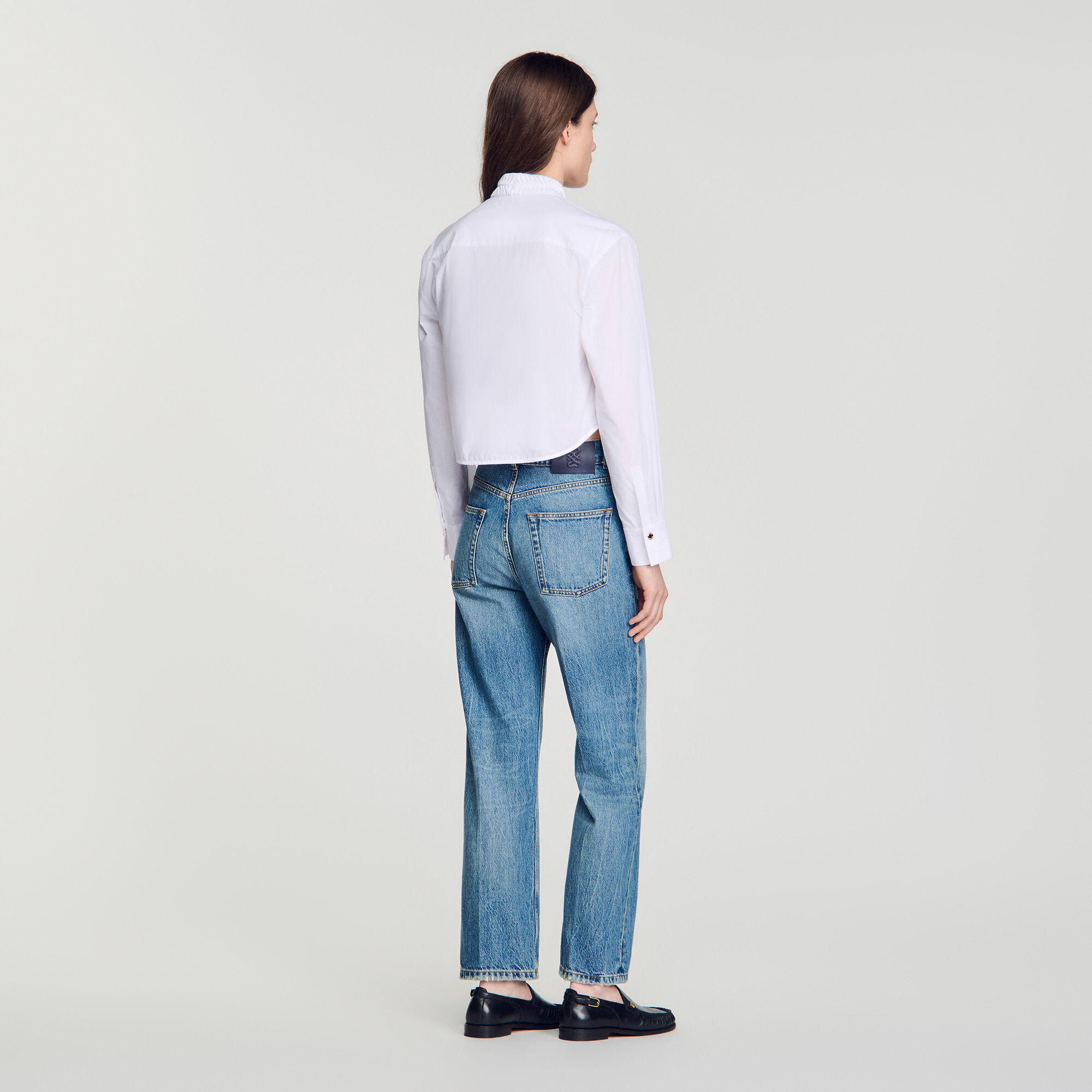 Pleated shirt with origami collar