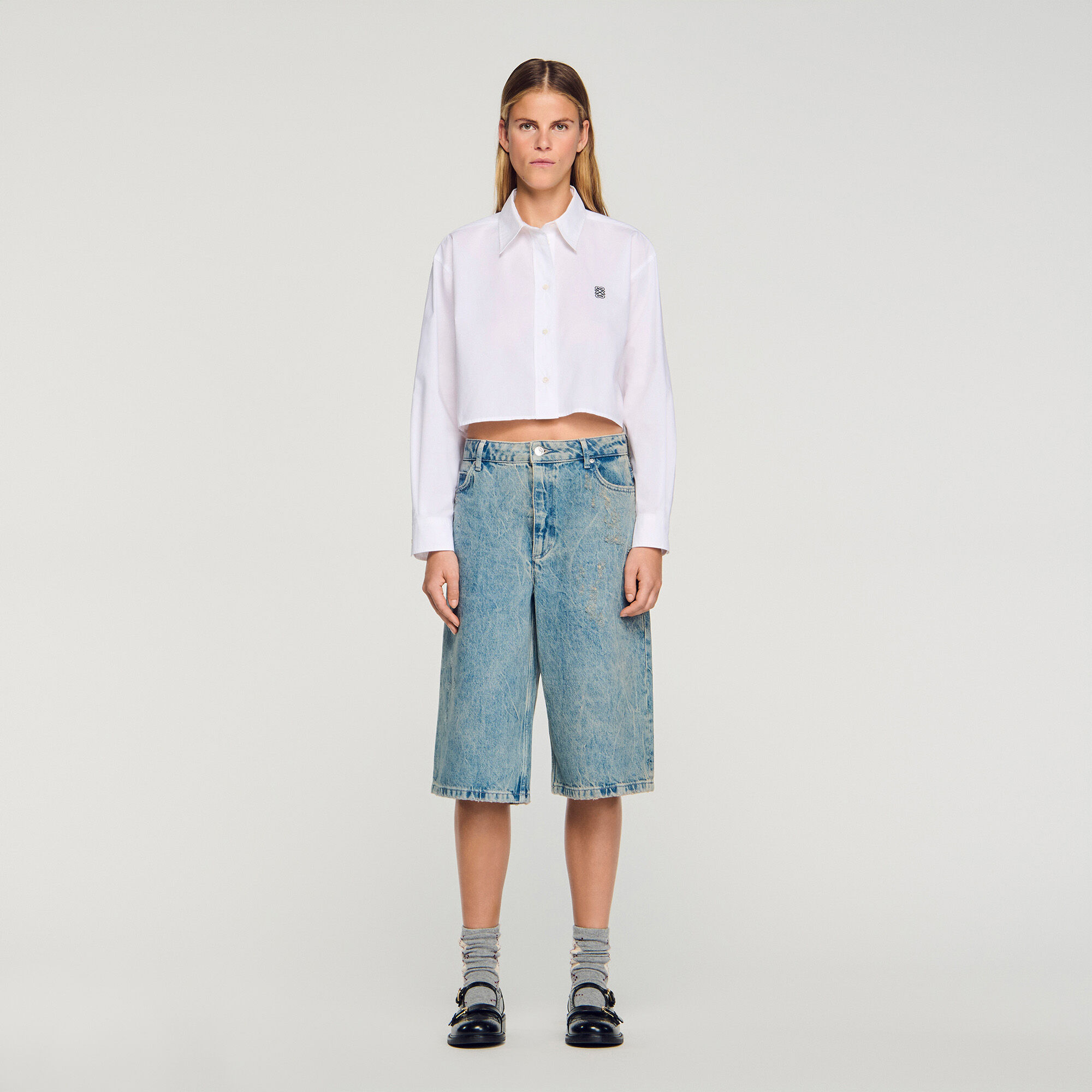 Distressed denim Bermuda shorts