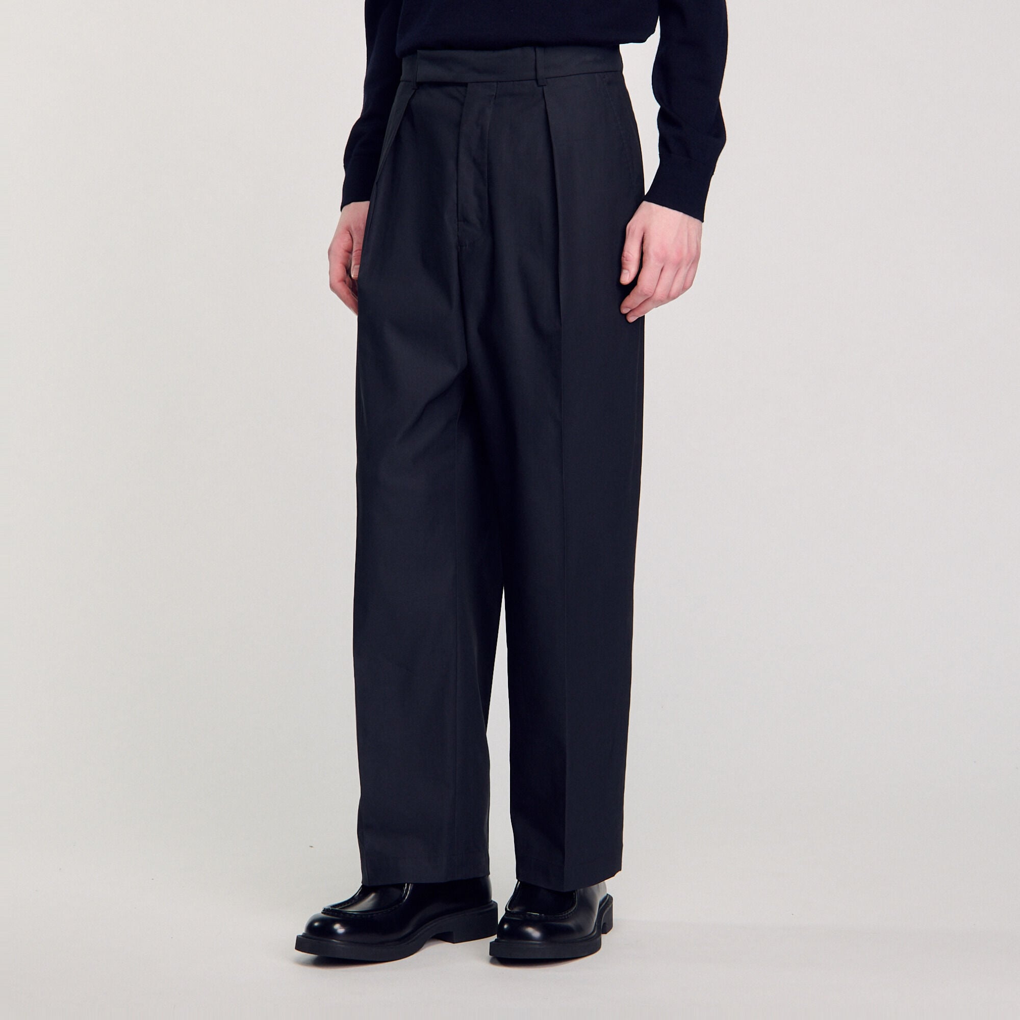 Wide-leg trousers with creases - Men | Sandro