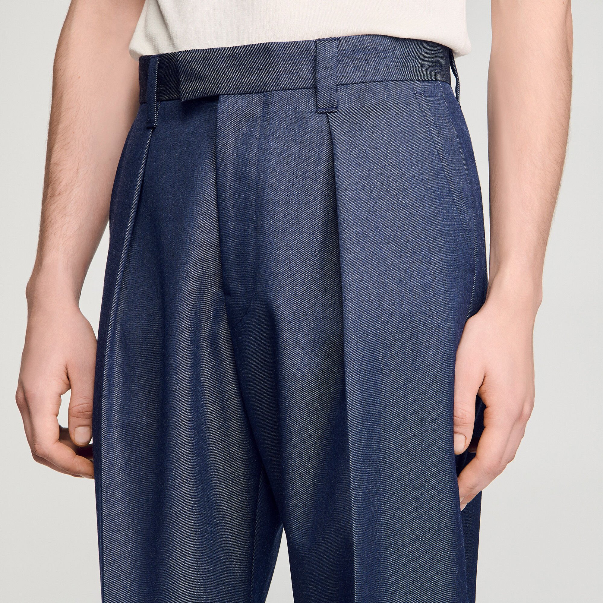 Pleated denim-effect trousers