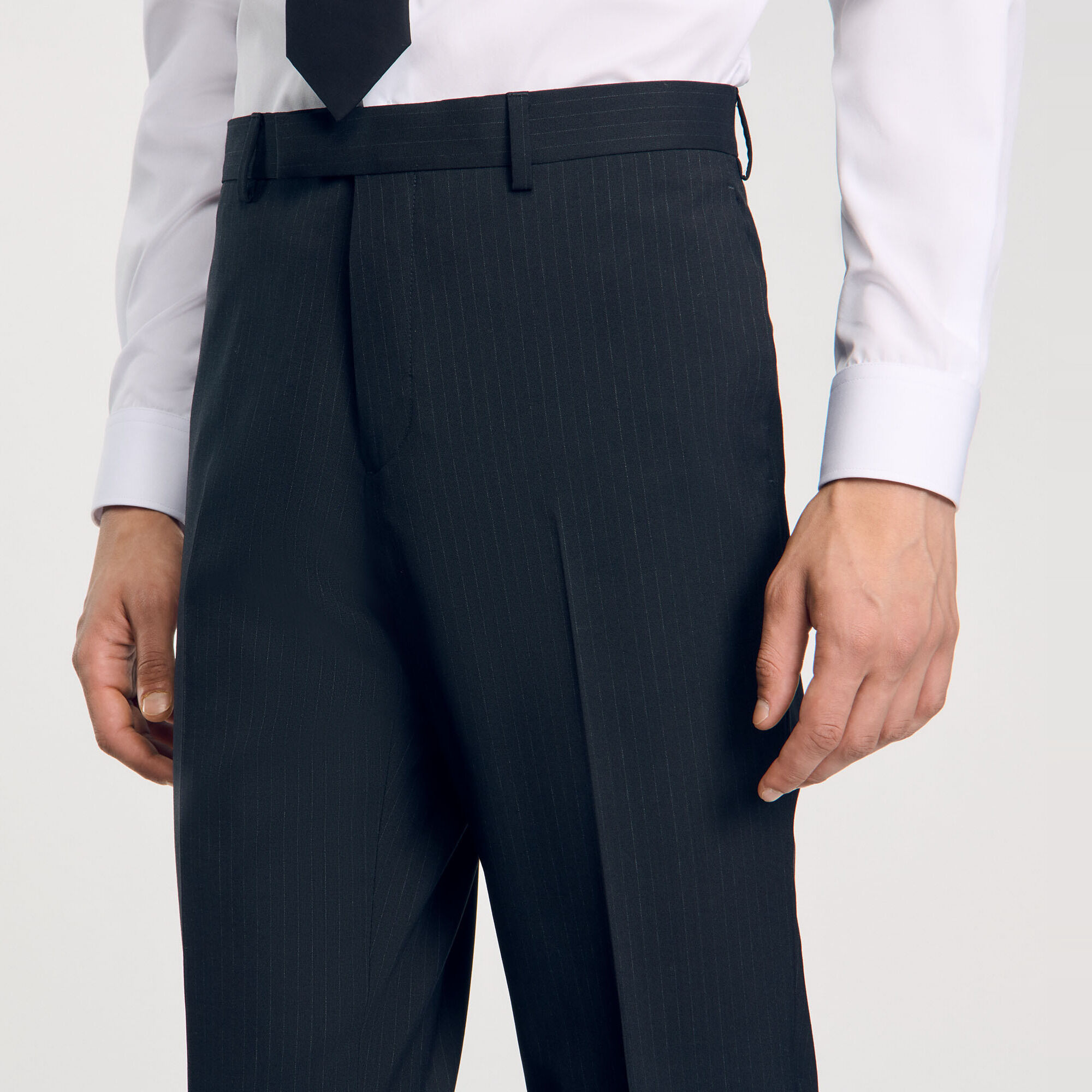Chalk-striped suit trousers